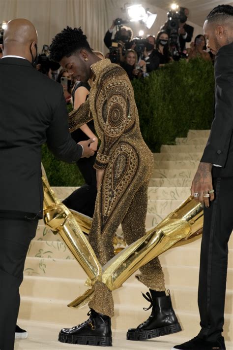 Lil Nas X wears three gold outfits on Met Gala 2021 red carpet