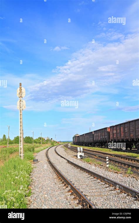 train on small railway station Stock Photo - Alamy