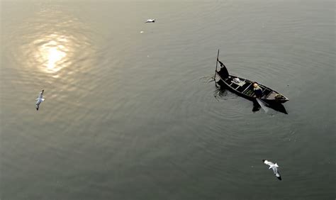 Photos: Fishing in Yamuna river