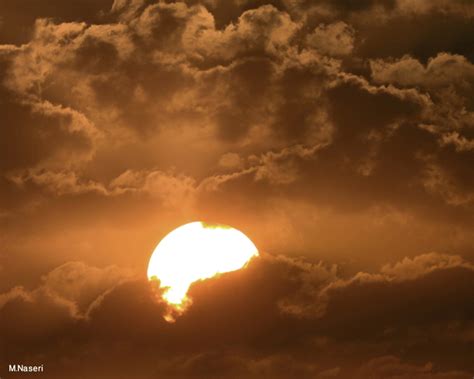 The Sun Surrounded by Clouds - Sky & Telescope - Sky & Telescope