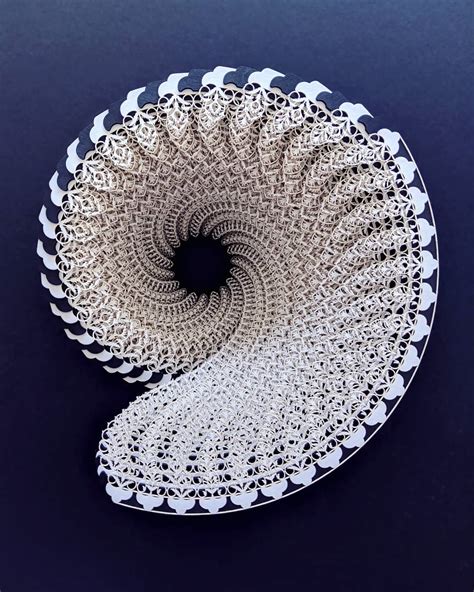 Intricate Designed Laser Cut Paper Sculptures by Julia Ibbini