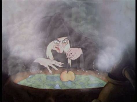 Snow White Witch making the poison apple | Walt disney movies, Disney ...