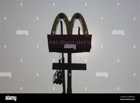 Mcdonalds golden arches in silhouette hi-res stock photography and ...