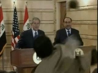 Man Throws Shoes At Bush on Make a GIF