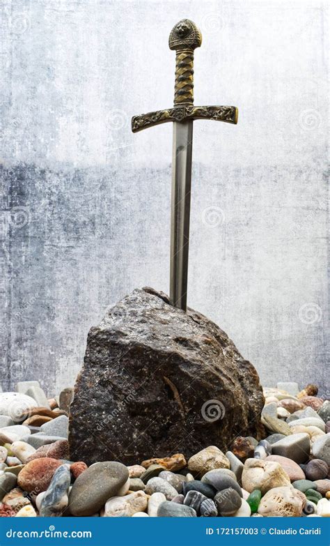 Excalibur, the Mythical Sword in the Stone of King Arthur Stock Image ...