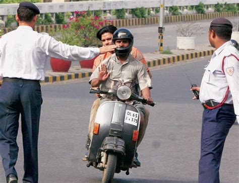 Now Riding A Two-Wheeler With Slippers Invites You A Traffic Challan ...