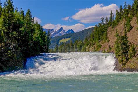 Bow Falls and River in Banff Stock Photo - Image of sunny, clouds ...