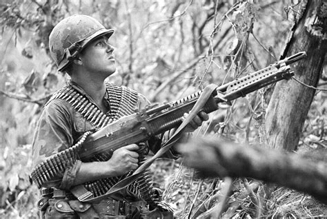 Vietnam War 1969 | An American paratrooper fires his M60 mac… | Flickr