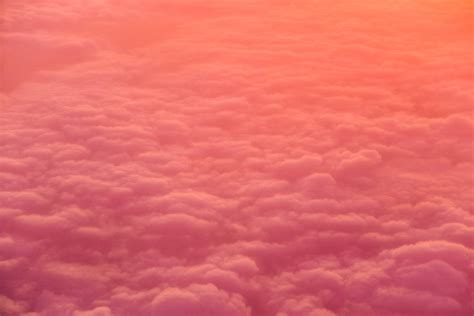 Download Orange Aesthetic Fluffy Clouds Wallpaper | Wallpapers.com