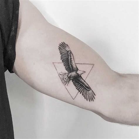 Eagle tattoo by Mr.Gulliver inked on the left arm | Eagle tattoo, Eagle ...