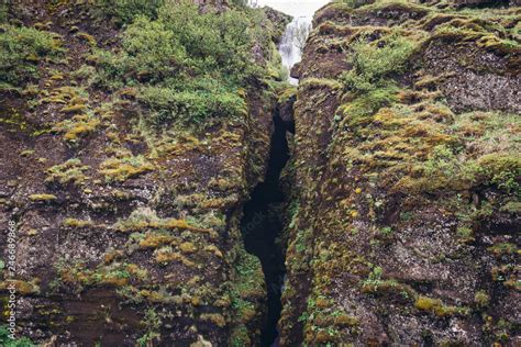 Gljufrafoss waterfall located next to famous Seljalandsfoss waterfall ...