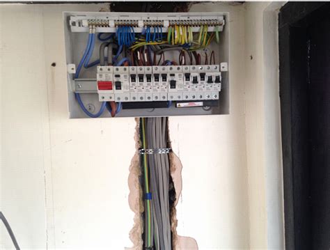 House rewiring in Surbiton. Complete rewire, sockets & switches