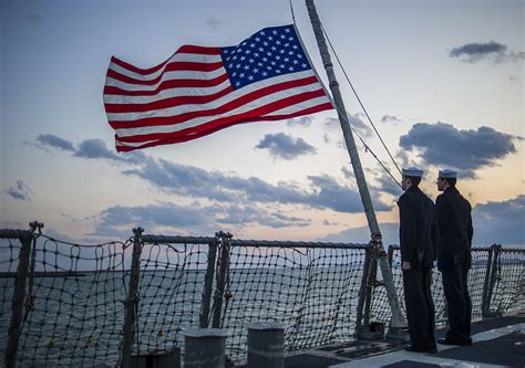 Sailors lower the ensign US Flag US Navy Painting by Celestial Images ...