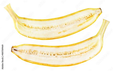 Yellow banana cut in half inside longitudinal section isolated on white ...