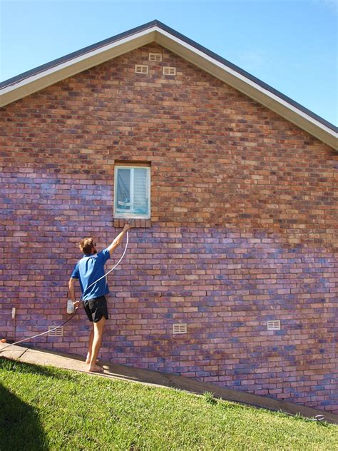 Painting the exterior brick walls of our home | Glamour Coastal Living