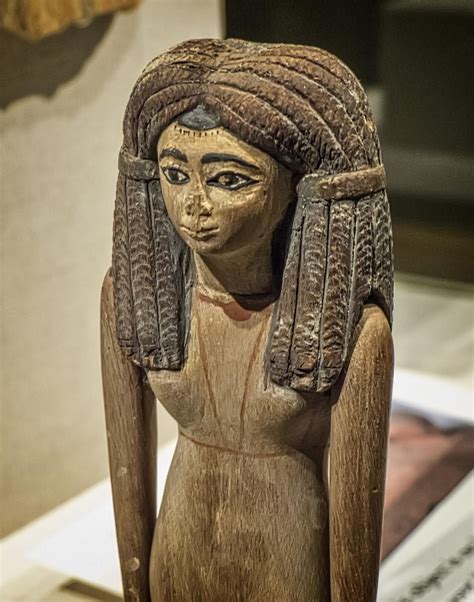 Closeup of wooden figurine of a woman Egypt Middle Kingdom 12th Dynasty ...