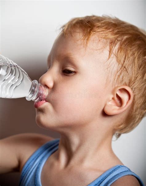 The Boy is Drinking Water from Bottle Stock Image - Image of infant ...