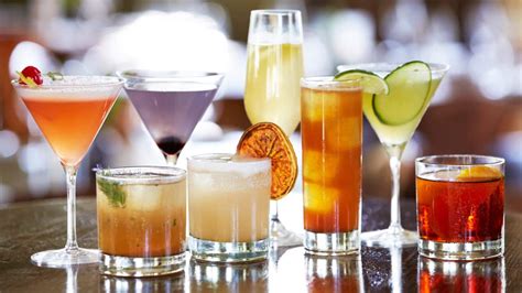 an arrangement of different cocktail drinks