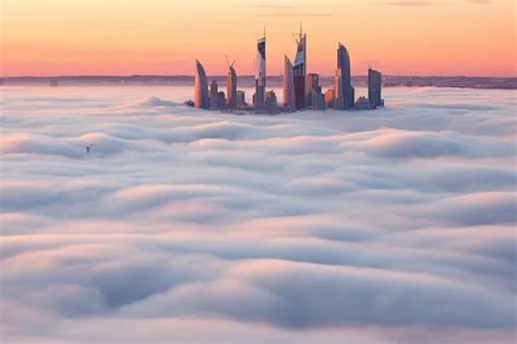 Premium AI Image | Mystical Cityscape Captivating Foggy Skyline Photo ...