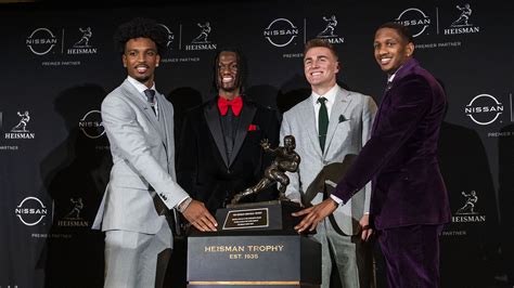 8 photos of the 2023 Heisman Trophy finalists looking…