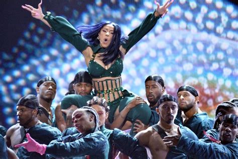 Look: Cardi B shows off huge, floral back tattoo - UPI.com