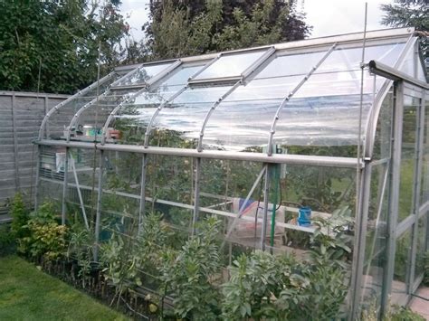 How to Build a Hoop House Style Greenhouse on a Tight Budget · The Wow ...