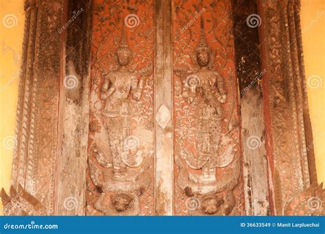 Ancient Laos Art Wood Carving On Church In Si Saket Temple In Laos ...