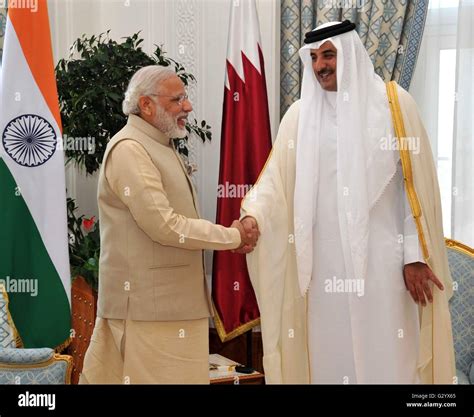 Emir of Qatar Sheikh Tamim Bin Hamad Al Thani, right, greets Indian ...