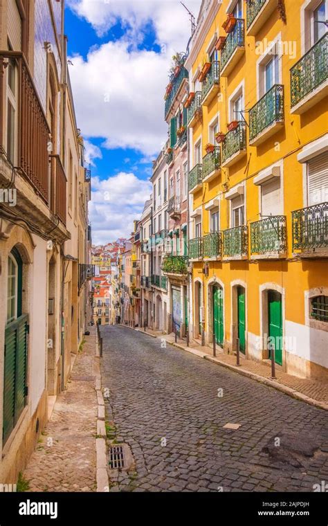 Lisbon, Portugal street perspective view with colorful traditional ...