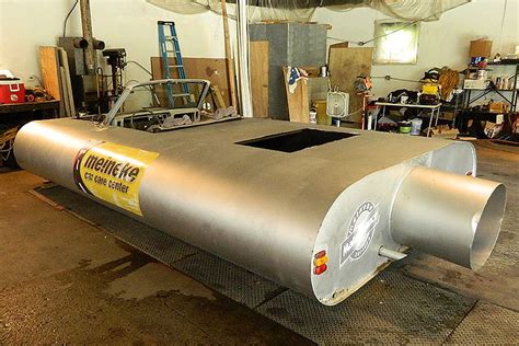 Meet the Car That’s Shaped Like a Meineke Muffler