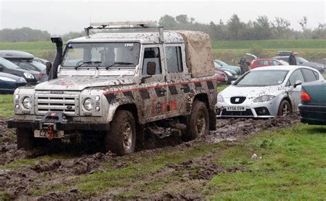 Cars stuck in mud at car park after Festival No 6 - North Wales Live