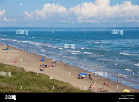 Beach-goers enjoy warm weather in November in South Padre Island, Texas ...