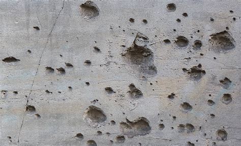 Bullet Hole Wall Stock Photos, Pictures & Royalty-Free Images - iStock