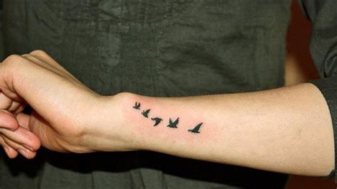 Amazing Small Bird Tattoo on Arm - Small Bird Tattoos - Small Tattoos ...