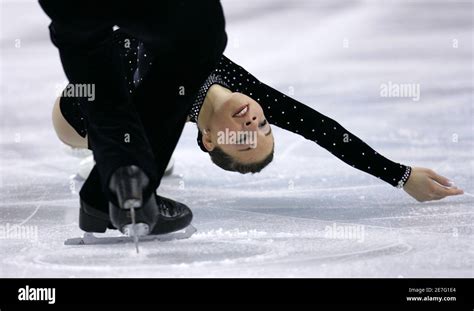 Jessica Dube (R) and Bryce Davison of Canada perform during the figure ...