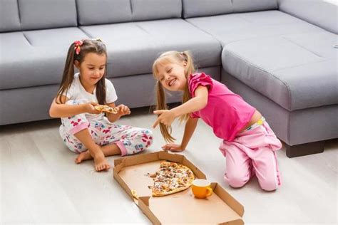 Kids Eating Pizza Stock Photos, Images and Backgrounds for Free Download