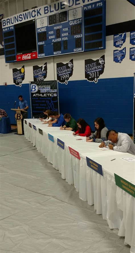 Brunswick High School honors student athletes at college signing event ...