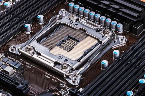 Premium Photo | Cpu socket and processor on the motherboard