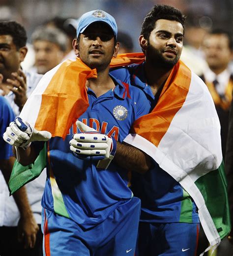 MS Dhoni and Virat Kohli with the India flag | ESPNcricinfo.com