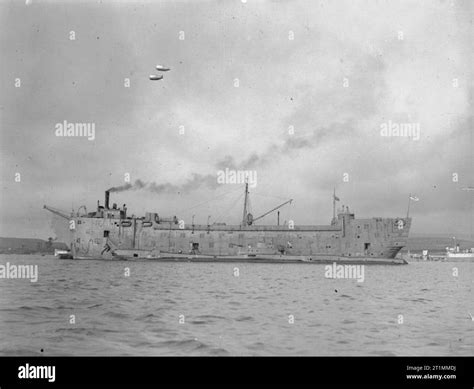 The Royal Navy during the Second World War Depot ship HMS EXMOUTH with ...