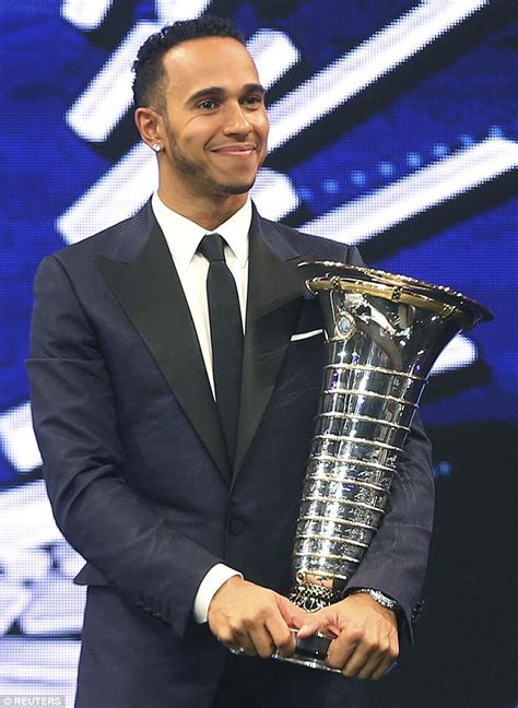 Lewis Hamilton presented with drivers' championship trophy at FIA ...