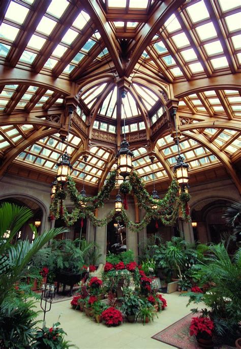 Winter Garden inside Biltmore House with Christmas decorations ...