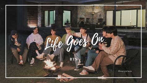 group of people sitting around a campfire with the words life goes on ...