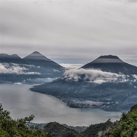 Lake Atitlan in Guatemala its surrounded by volcanoes the view from the ...