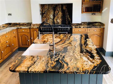 Magma Gold Granite Worktops | Gold granite countertops, Granite ...