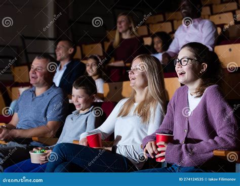 Parents with Children Laughting at Movie in Cinema Stock Image - Image ...