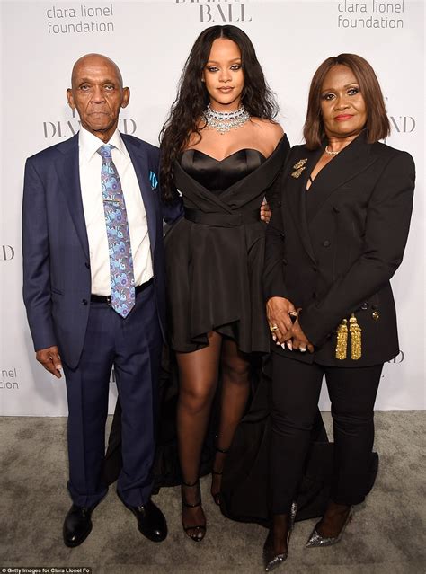 Rihanna poses with her parents at her 3rd annual Diamond ball | This Is ...