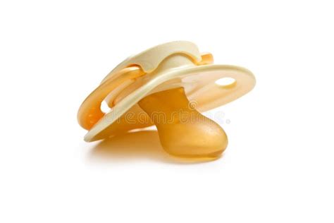 Yellow pacifier stock photo. Image of isolated, rubber - 17361976