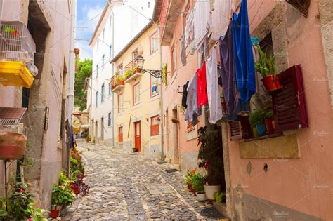 street in old town of Lisbon | Architecture Stock Photos ~ Creative Market