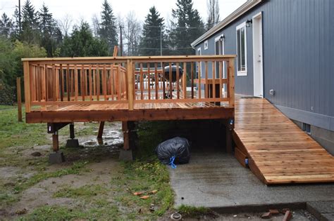 Deck with a wheelchair ramp and stairs – SUNSET DECKS